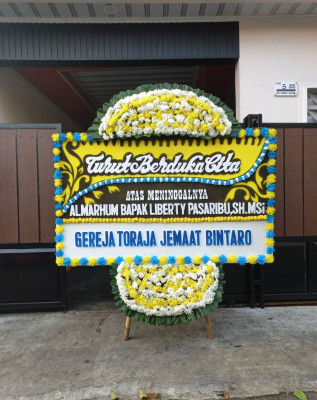 Papan Bunga Duka di Paniai Barat